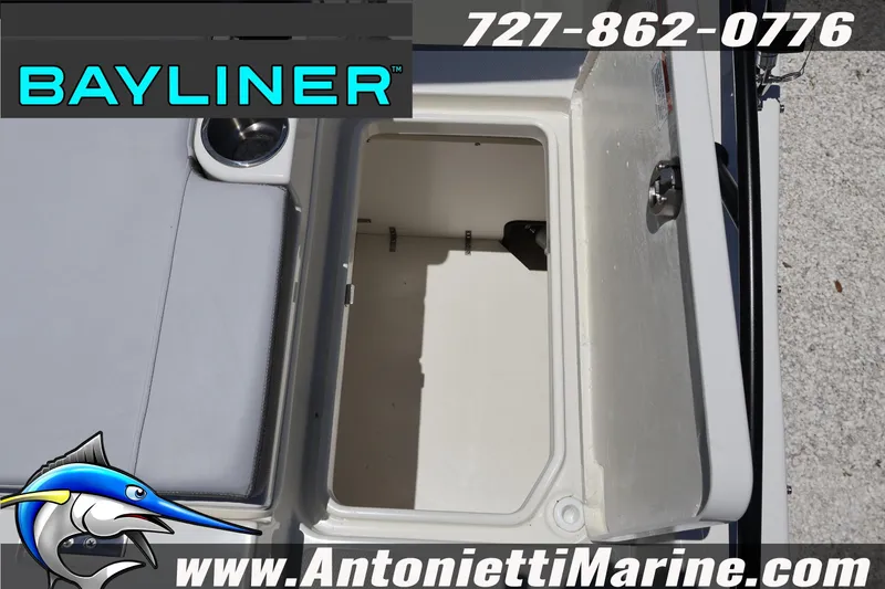 Slide: The Image of Open storage compartment on 2026 Bayliner D20 boat, featuring sleek design and functionality. - 15