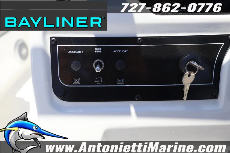 Slide: The Image of Control panel of 2026 Bayliner D20 boat with key ignition and accessory switches. - 21