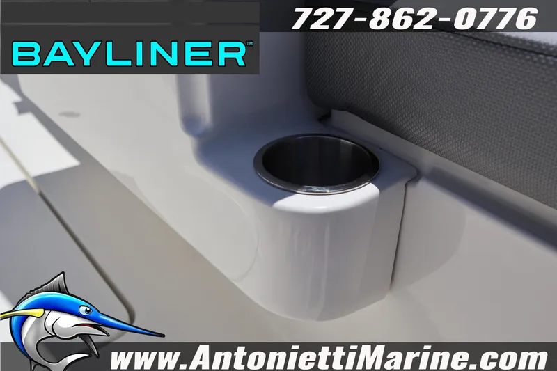 Slide: The Image of 2026 Bayliner D20 boat cup holder detail with logo and contact information. - 28