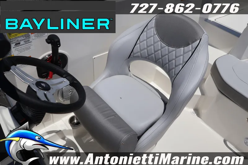 Slide: The Image of 2026 Bayliner D20 boat interior with steering wheel and cushioned seat, Antonietti Marine branding. - 31