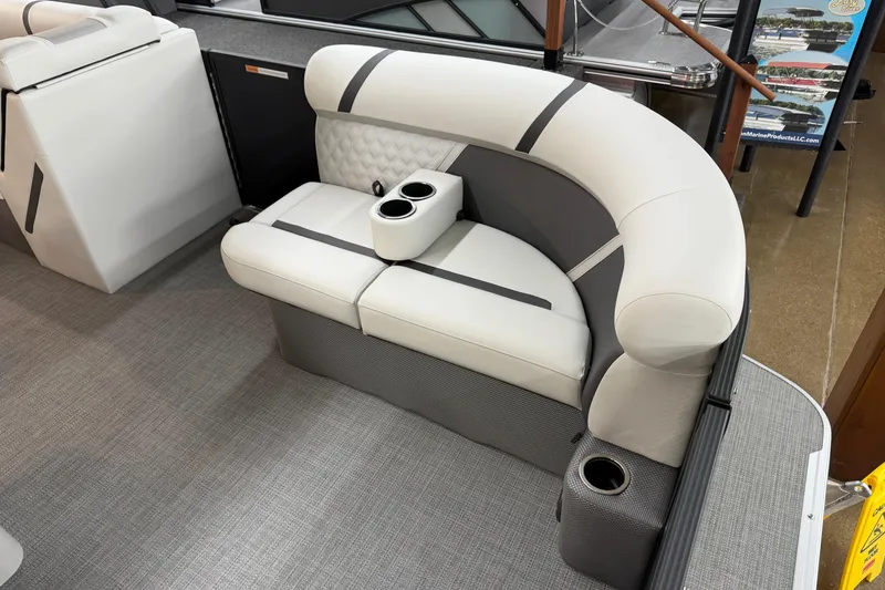 Slide: The Image of 2025 Crest Classic 200 boat interior with stylish seating and cup holders. - 3