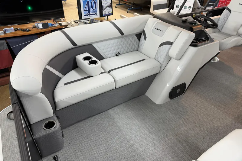 Slide: The Image of Luxurious seating in 2025 Crest Classic 200 boat with cup holders and modern design. - 4