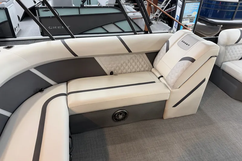 Slide: The Image of Luxurious seating in 2025 Crest Classic 200 boat, featuring elegant upholstery and modern design. - 8