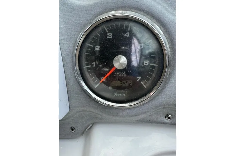 Slide: The Image of Tachometer of 2015 Hurricane SunDeck 2400 OB showing RPM and hours. - 19