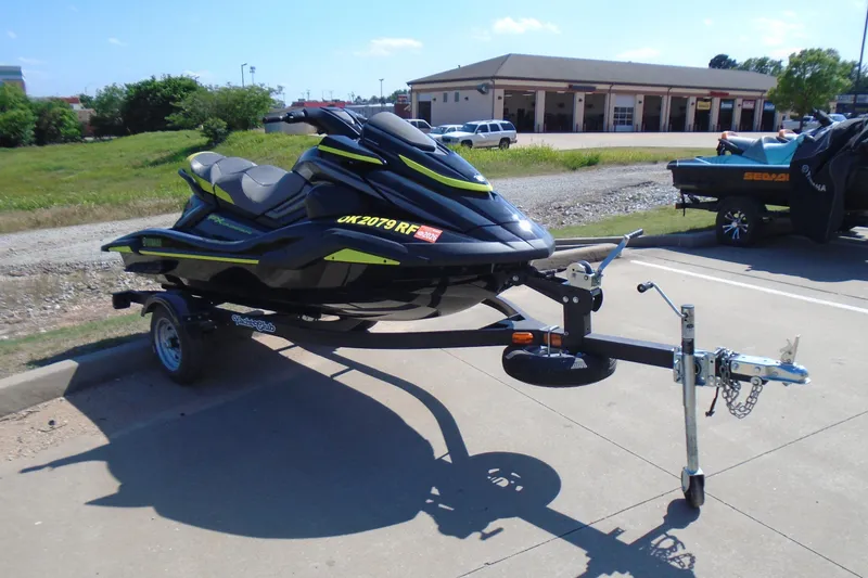 Slide: The Image of 2023 Yamaha WaveRunner FX Cruiser SVHO on trailer, parked outdoors in a lot. - 6