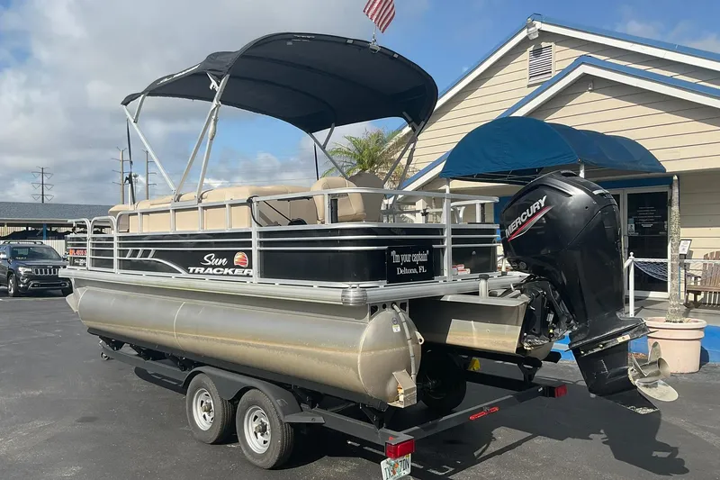 Slide: The Image of 2021 Sun Tracker Fishin' Barge 20 DLX pontoon boat with Mercury outboard motor. - 8