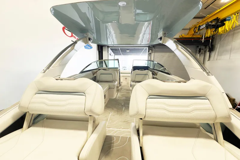Slide: The Image of 2024 Regal LX9 boat interior with luxurious seating and modern design. - 5