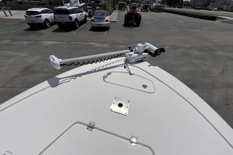 Slide: The Image of 2016 Tidewater 1910 Bay Max boat with trolling motor in parking lot. - 9