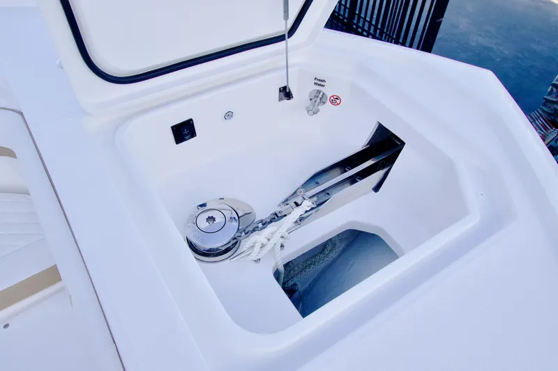 Slide: The Image of Anchor compartment of 2027 Regulator 35 boat with winch and rope. - 19
