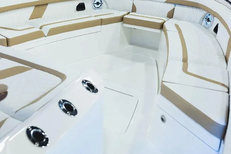 Slide: The Image of Manufacturer Provided Image: 2026 Regulator 35 boat interior with white and tan seating, modern design. - 6