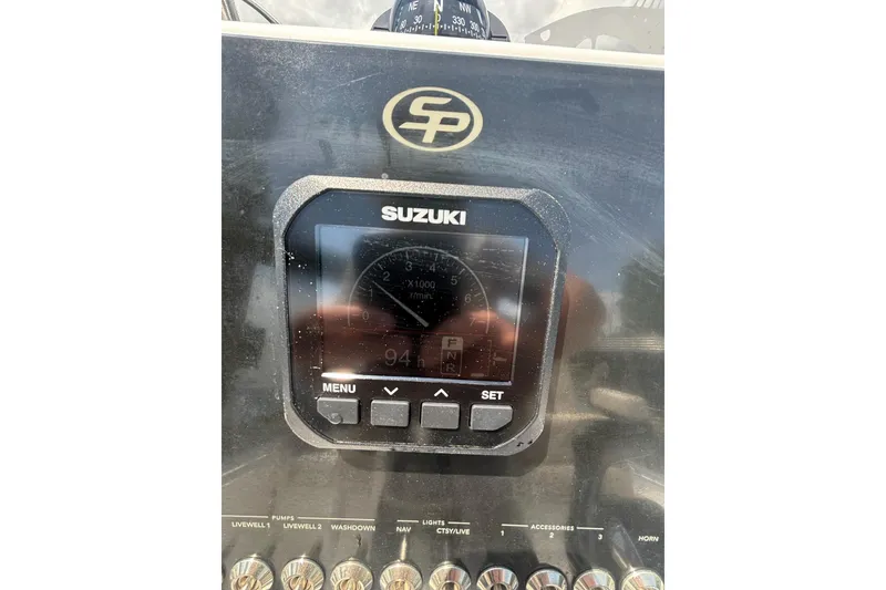 Slide: The Image of Control panel of 2023 Sea Pro 228 Bay boat with Suzuki display. - 13