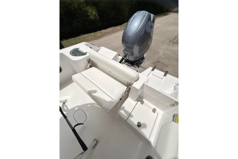 Slide: The Image of 2015 Sportsman Open 212 Center Console boat with Yamaha 150 outboard motor. - 12
