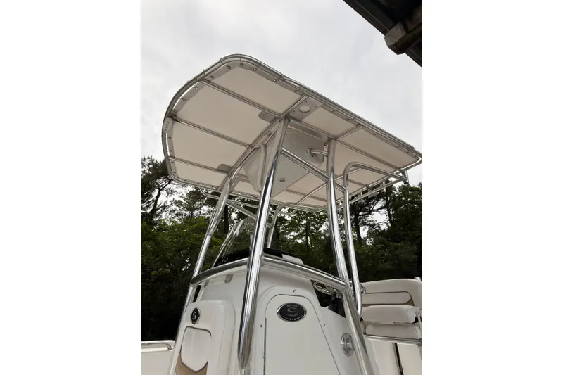 Slide: The Image of 2015 Sportsman Open 212 Center Console boat with T-top and sleek design. - 17