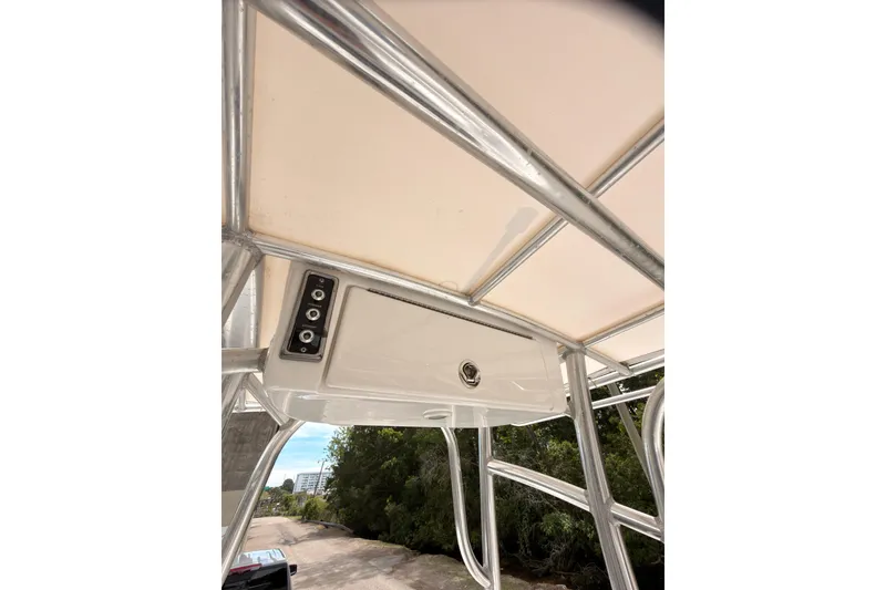 Slide: The Image of 2015 Sportsman Open 212 Center Console boat's overhead console and framework. - 20