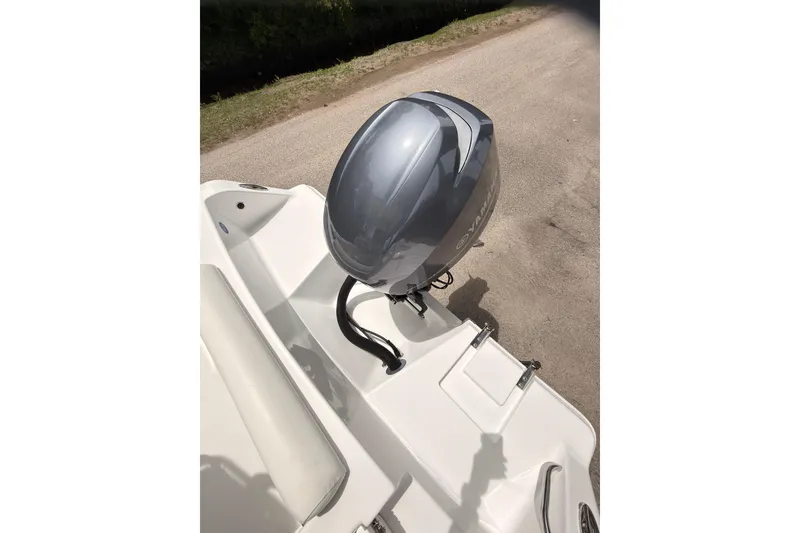 Slide: The Image of 2015 Sportsman Open 212 Center Console boat with Yamaha outboard motor. - 26
