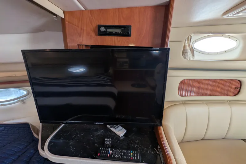 Slide: The Image of Interior of 2003 Rinker Fiesta Vee 342 with TV and audio system. - 41