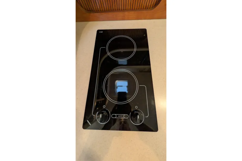 Slide: The Image of Ceramic cooktop on 2003 Rinker Fiesta Vee 342 boat kitchen counter. - 51