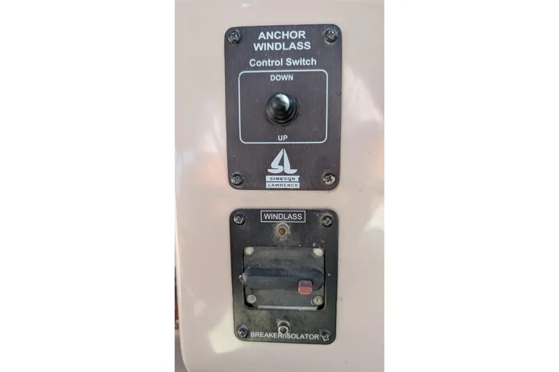 Slide: The Image of Anchor windlass control switch on 2003 Rinker Fiesta Vee 342 boat panel. - 55