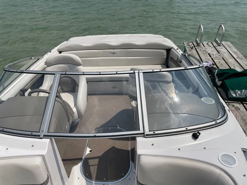 Slide: The Image of Interior view of a 2002 Four Winns 200 Horizon boat at dock. - 5
