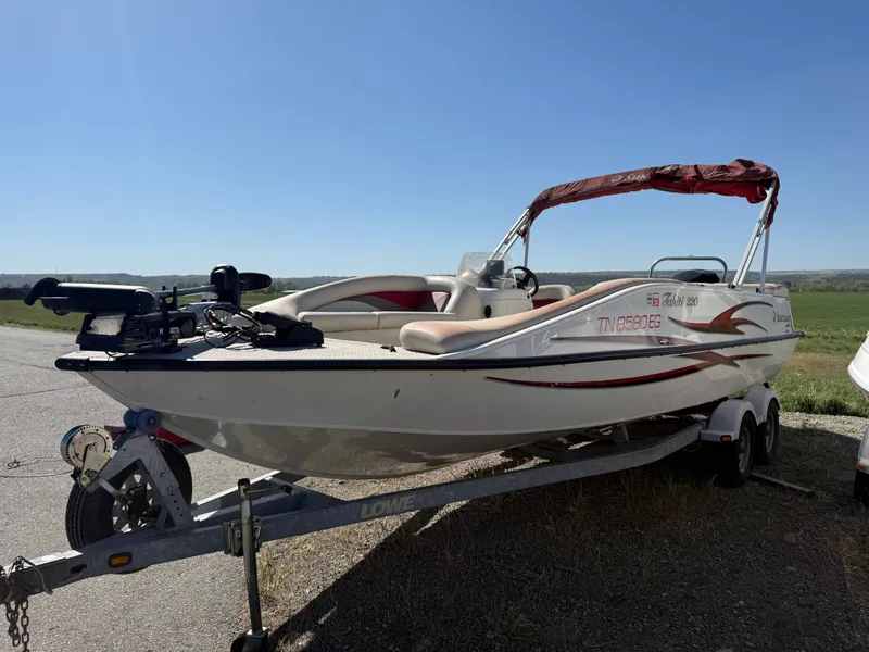 Slide: The Image of 2007 Tahiti Offshore Boats Suncruiser 220 on trailer, side view. - 3