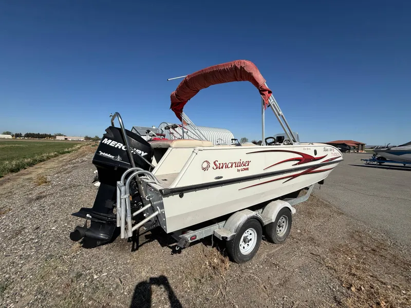 Slide: The Image of 2007 Tahiti Offshore Boats Suncruiser 220 on trailer, side view. - 4