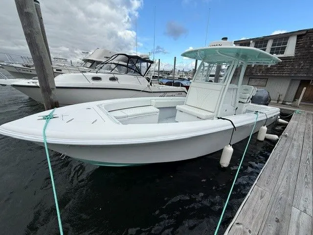 The Image of 2024 Contender 28 Tournament boat docked at marina. - 0