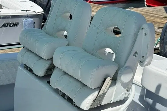 Slide: The Image of 2024 Contender 28 Tournament boat seats in white leather. - 12