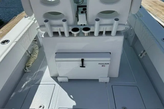Slide: The Image of 2024 Contender 28 Tournament boat stern with fishing rod holders. - 15