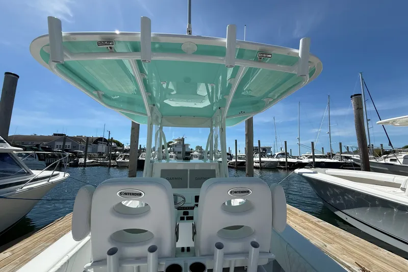 Slide: The Image of 2024 Contender 28 Tournament boat in harbor, sunny day. - 4