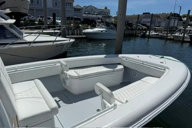 Slide: The Image of 2024 Contender 28 Tournament boat in harbor, modern design. - 9