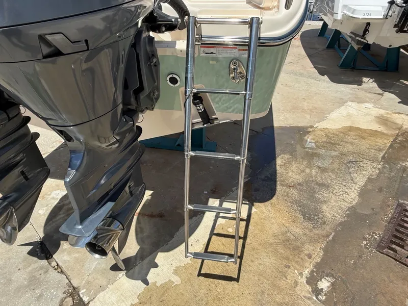 Slide: The Image of Grady-White Freedom 255 boat with ladder, year 2020. - 15