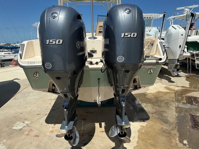Slide: The Image of Grady-White Freedom 255 boat with Yamaha 150 engines, year 2020. - 24