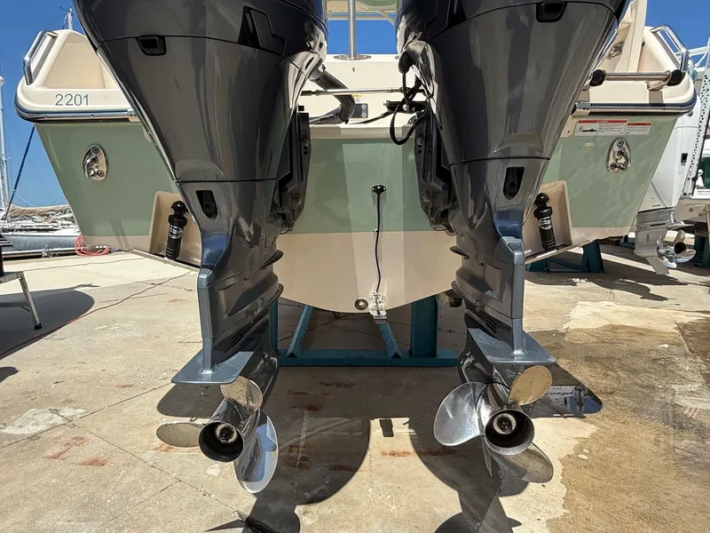 Slide: The Image of Grady-White Freedom 255 boat with dual outboard motors, year 2020. - 27
