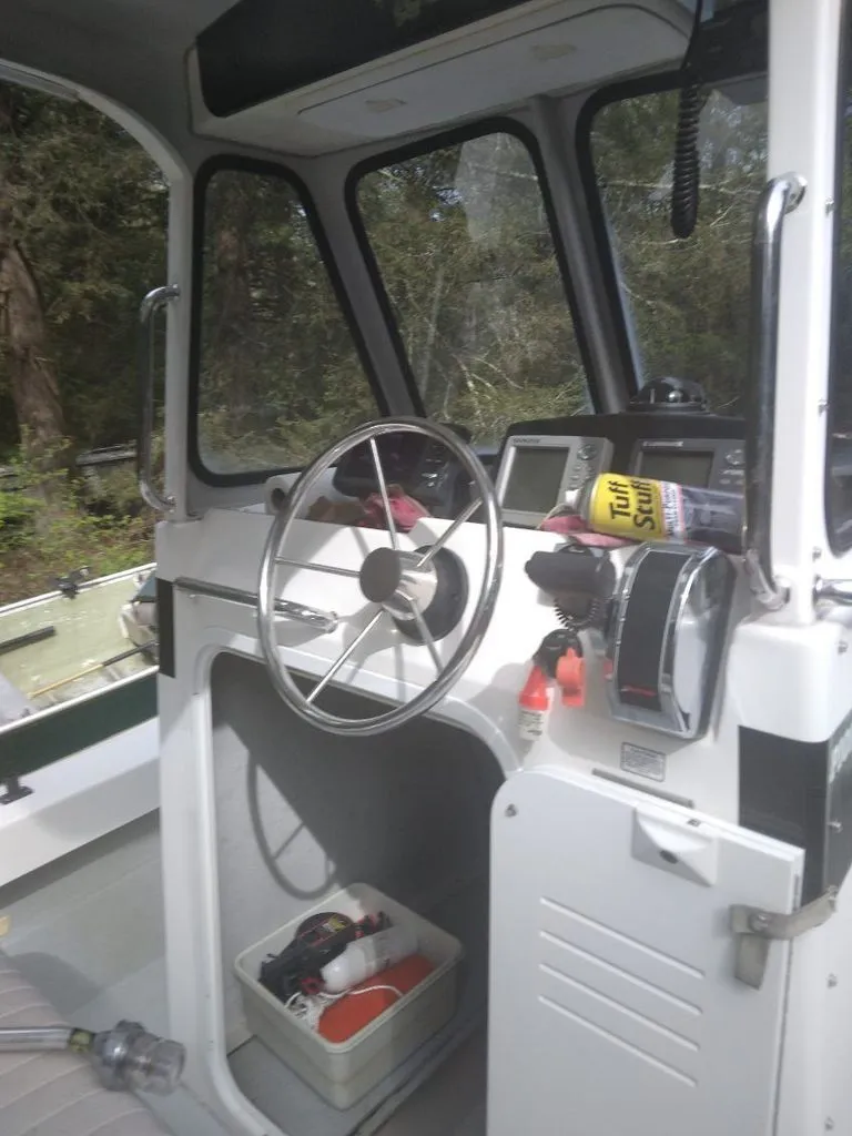 Slide: The Image of Helm of a 2010 Maritime International Pioneer boat. - 5
