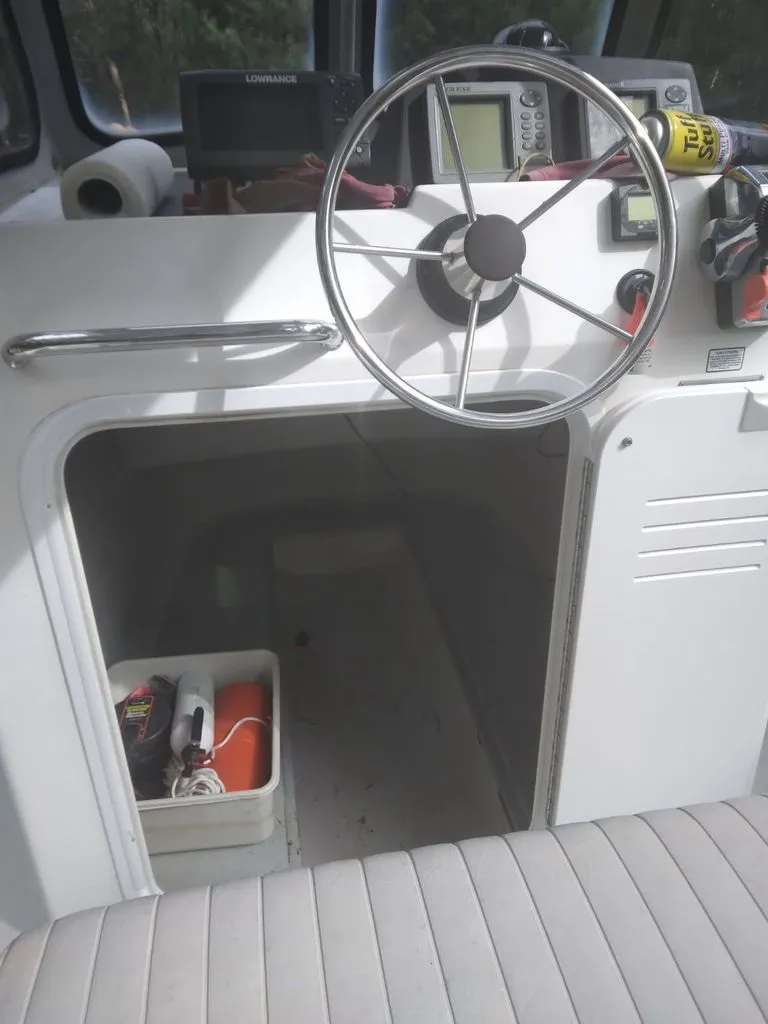 Slide: The Image of Helm of a 2010 Maritime International Pioneer boat. - 6