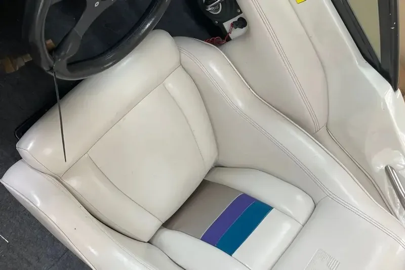 Slide: The Image of Interior of a 1994 MasterCraft 205 Prostar with white seat. - 3
