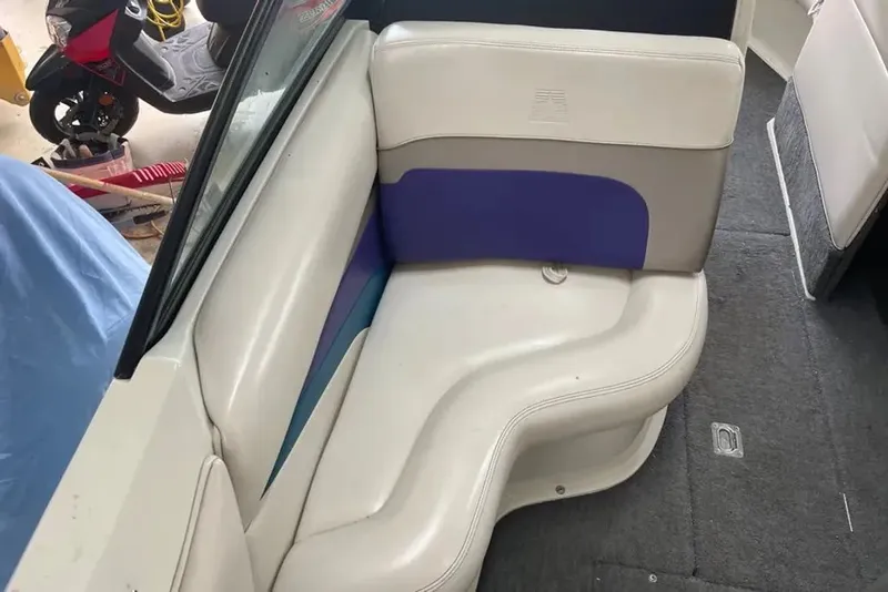 Slide: The Image of Interior of a 1994 MasterCraft 205 Prostar boat with seating area. - 5