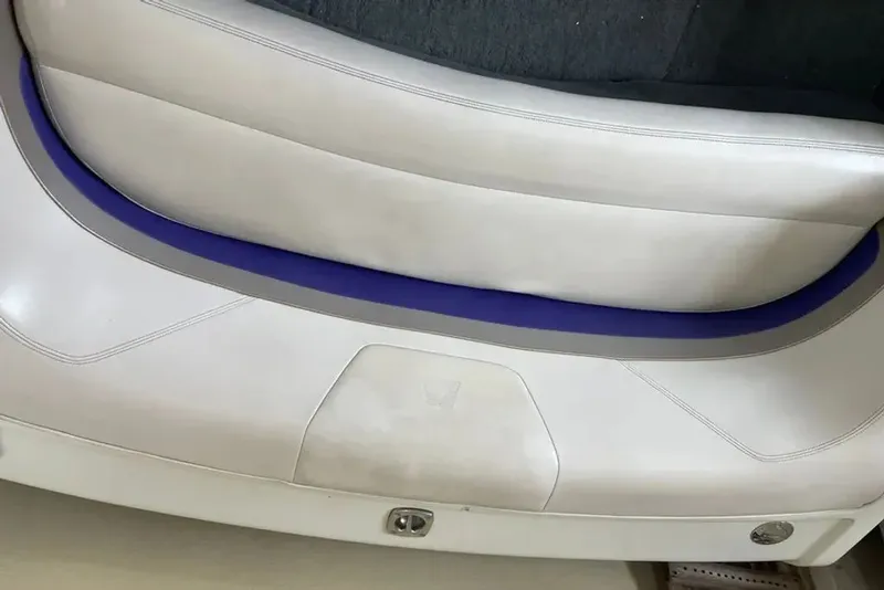Slide: The Image of Rear seat of 1994 MasterCraft 205 Prostar boat, white upholstery. - 6