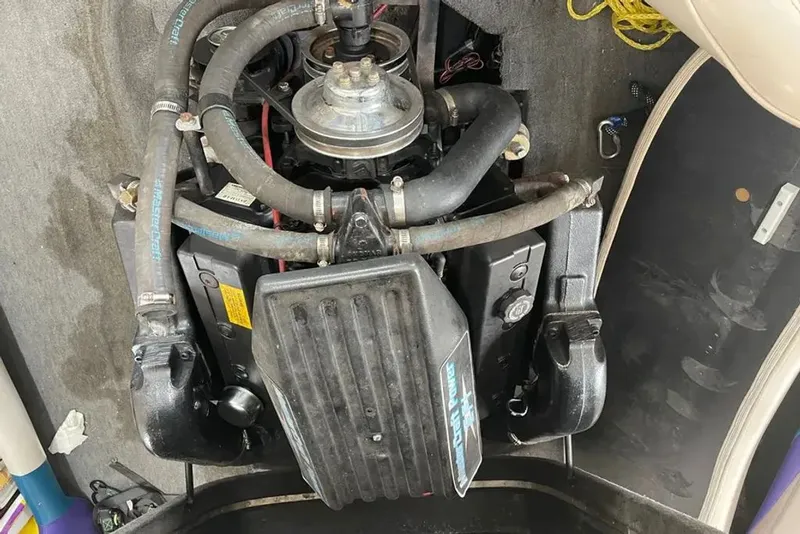Slide: The Image of Engine of a 1994 MasterCraft 205 Prostar boat, close-up view. - 8
