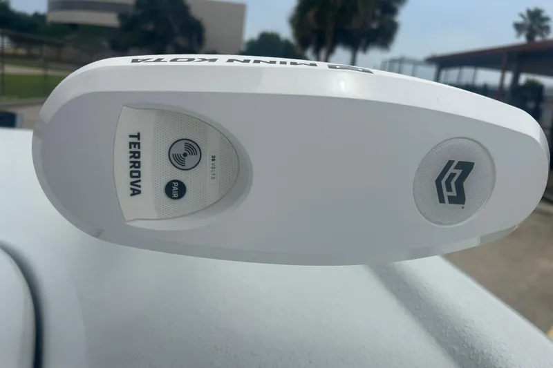 Slide: The Image of White Skuta 24 device with Terrova branding, featuring pairing and voltage indicators. - 8