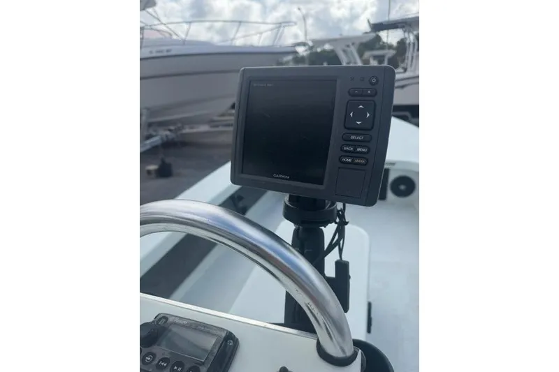 Slide: The Image of Boat dashboard with Garmin GPS on a 2013 Ankona Native SUV. - 6