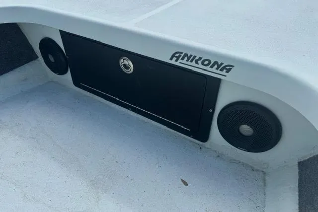 Slide: The Image of 2013 Ankona Native SUV boat interior with speakers and storage compartment. - 8