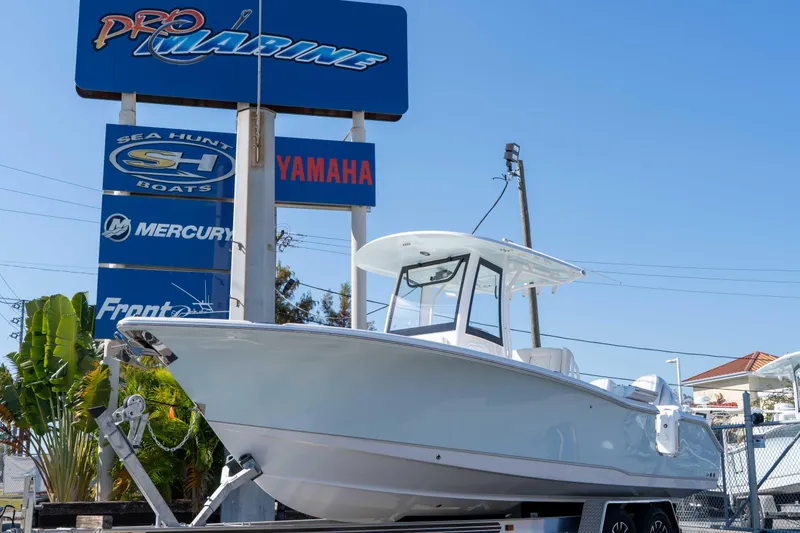 The Image of 2026 Sea Hunt Ultra 265 SE boat displayed at Pro Marine dealership. - 0