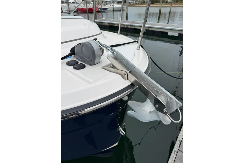 Slide: The Image of 2026 Ranger Tugs R-25 boat with anchor system at marina dock. - 6
