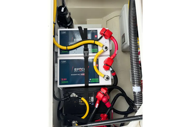 Slide: The Image of Battery compartment of 2026 Ranger Tugs R-25 with Epoch 12.8V 300Ah batteries. - 29