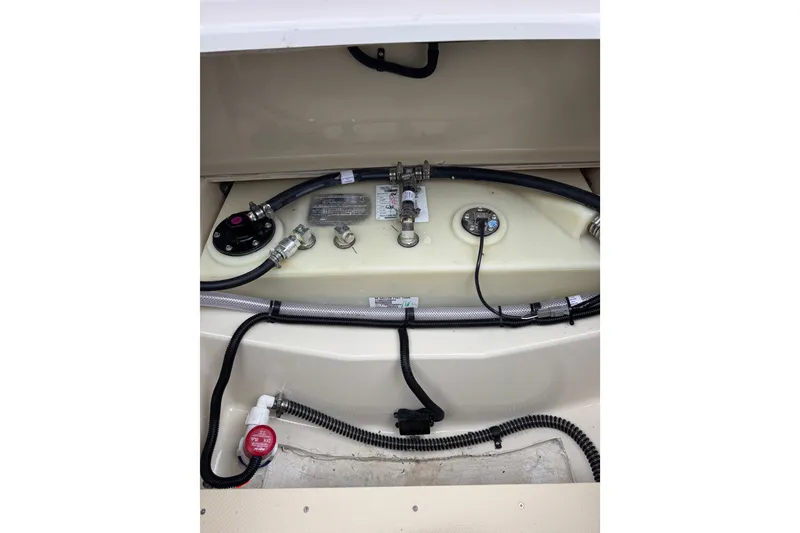 Slide: The Image of Fuel system of 2026 Ranger Tugs R-25 boat, showcasing hoses and connections. - 31
