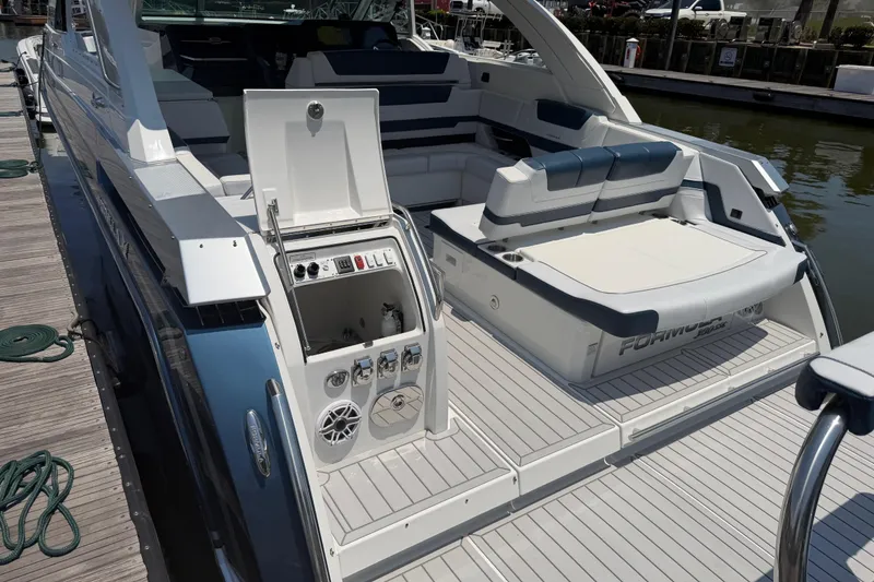 Slide: The Image of 2026 Formula 380 Super Sport Crossover OB luxury boat with spacious seating and sleek design. - 11