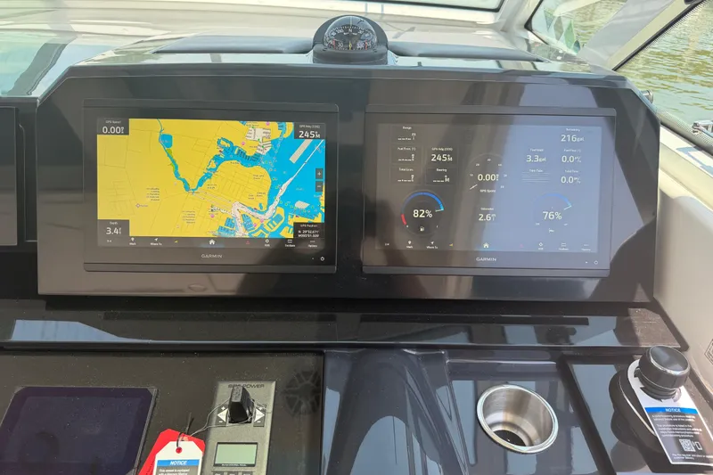 Slide: The Image of Dashboard of 2026 Formula 380 Super Sport Crossover OB with Garmin navigation displays. - 20