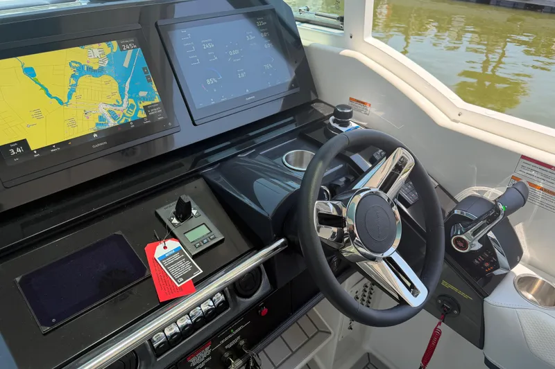 Slide: The Image of Helm of 2026 Formula 380 Super Sport Crossover OB with advanced navigation displays. - 21