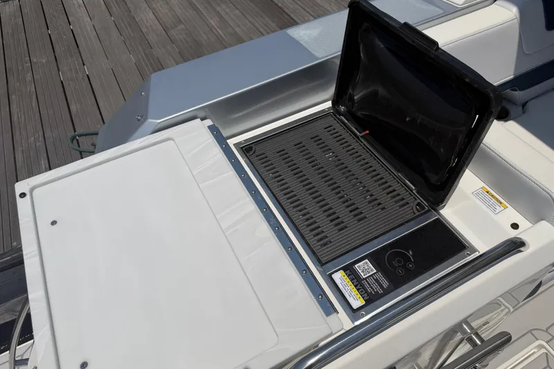 Slide: The Image of Outdoor grill on 2026 Formula 380 Super Sport Crossover OB boat deck. - 24